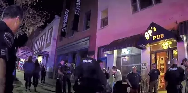 Burlington police at the scene of the incident involving the Meli brothers - STILL FROM BODYCAM FOOTAGE