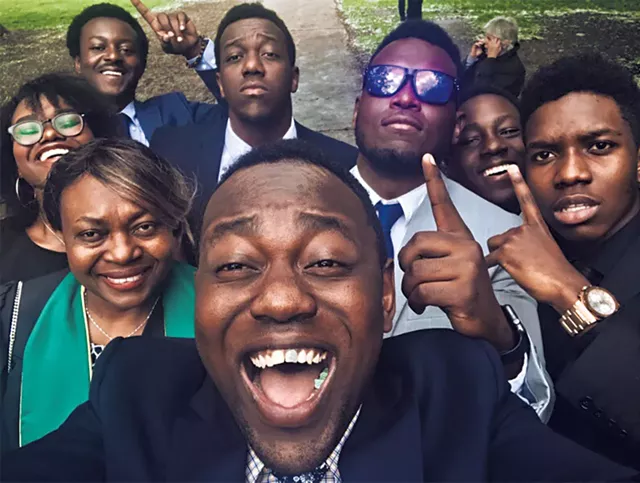 Beatrice Kambere (in green) with the Meli children and a nephew at Kambere's college graduation in 2018