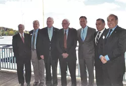 Left to right: Congressman Peter Welch, Bill Stenger, Sen. Patrick Leahy, Sen. Bernie Sanders, Gov. Peter Shumlin, Ariel Quiros, and William Kelly in Newport in 2012