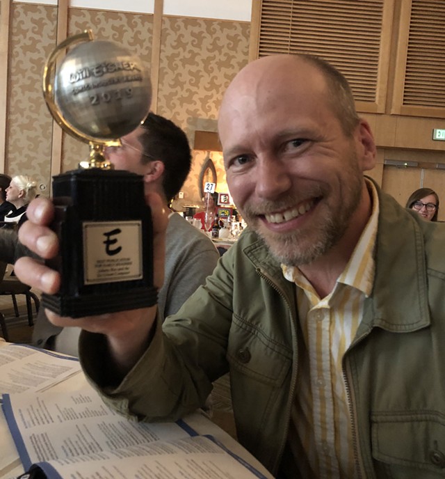 James Kochalka with his Eisner Award - LEIGH WALTON, TOP SHELF PRODUCTIONS