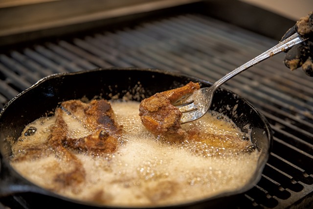 Frying squirrel legs at the Field-to-Fork: Wild Food Cooking seminar - JAMES BUCK