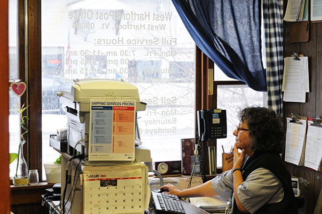 Postmaster Rosi O'Connell in the former West Hartford Post Office in 2011 - COURTESY OF JAMES M. PATTERSON/VALLEY NEWS