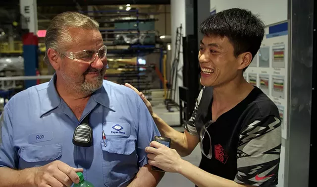 SIDE BY SIDE Chinese and American heartland - workers work through their differences in - Bognar and Reichert’s must-see documentary