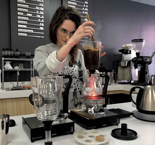 Alice Johnson preparing a siphon at the new location of Catalyst Coffee Bar - JORDAN BARRY