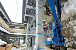 Sarah-Lee Terrat working on her atrium - JEB WALLACE-BRODEUR