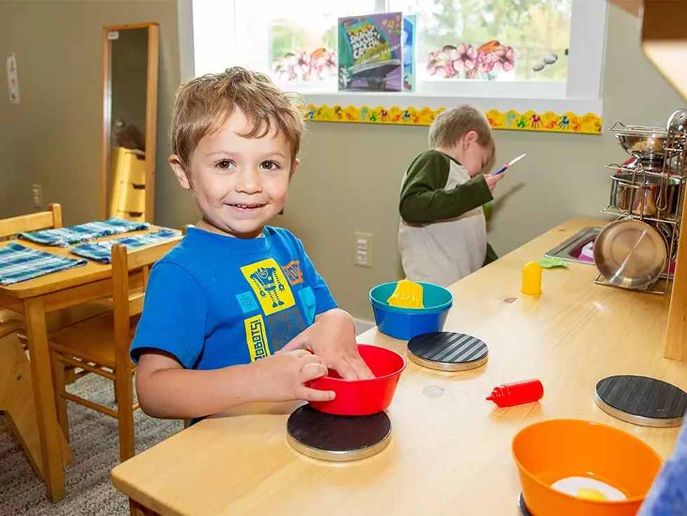 Hank and Carter in the play kitchen - WAYNE TARR