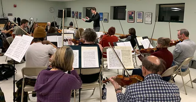 Kim Diehnelt conducting a Me2/Burlington rehearsal - DAN BOLLES