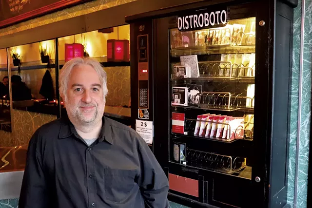 Louis Rastelli and a Distroboto zine vending machine - MARGARET GRAYSON