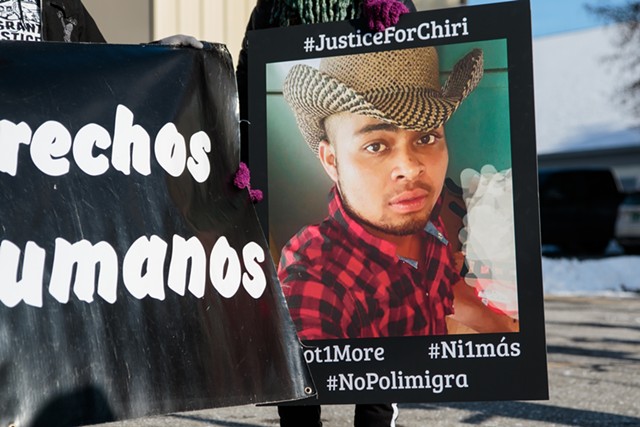 Protestors holding a photo of Luis Ulloa, who has been deported to Mexico - FILE: COLIN FLANDERS