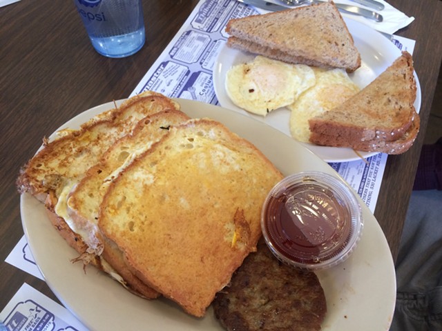 Three French Toast, $6.99, plus two eggs ($1) and more toast ($.75) - ALICE LEVITT