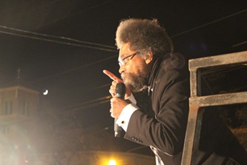 Dr. Cornel West speaks at a Sanders rally Saturday in Des Moines. - PAUL HEINTZ
