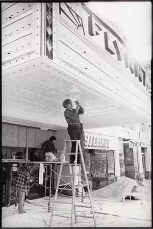 Repairing the marquee in the 1980s - COURTESY OF THE FLYNN CENTER