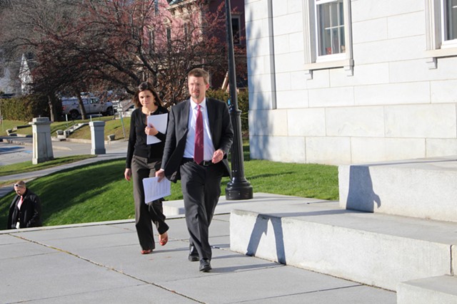 House Speaker Shap Smith and campaign manager Liz Sortino arrive at the Statehouse steps to announce the suspension of his campaign - PAUL HEINTZ