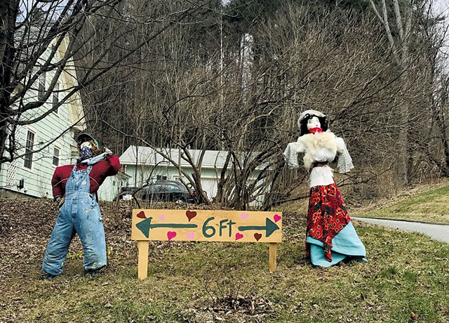 Photo submitted to the Vermont Historical Society's COVID-19 Archive in which scarecrows demonstrate proper social distancing in a Montpelier yard