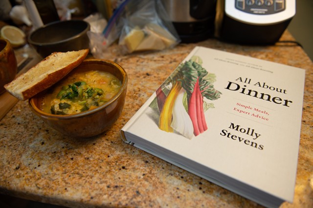 Bowl of soup and James Beard finalist cookbook by Molly Stevens - DARIA BISHOP