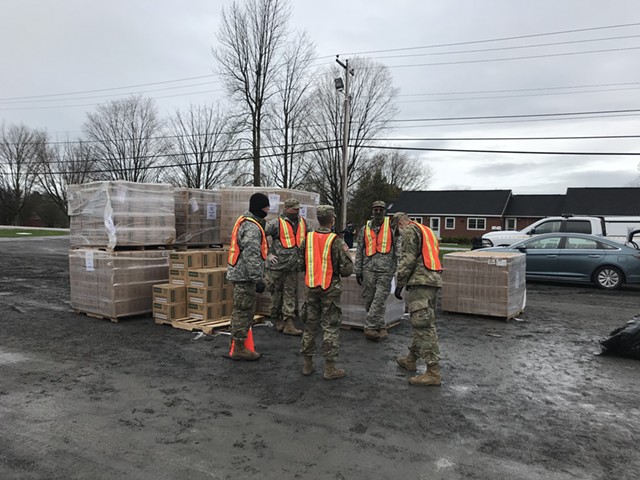 Vermont National Guard members and MREs on May 1 in South Hero - SALLY POLLAK