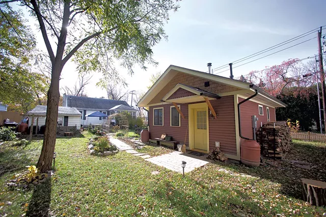 Ruby Perry and Andy Simon’s tiny house sits in a South End backyard. - JAMES BUCK