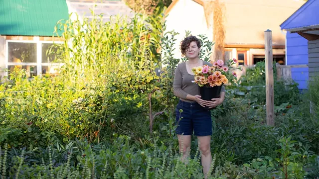 Kelsey Adams, owner of West Lane, in her Winooski backyard - LUKE AWTRY