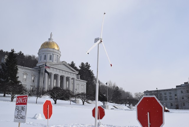 Vermont wind project opponents erected a model turbine on the Statehouse lawn. - TERRI HALLENBECK