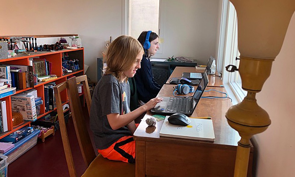 Dash and Lionelle doing remote schooling - COURTESY OF ANGELA ARSENAULT
