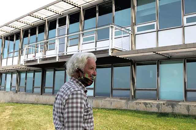 Project consultant John Caulo outside of Building 32 - COURTNEY LAMDIN ©️ SEVEN DAYS