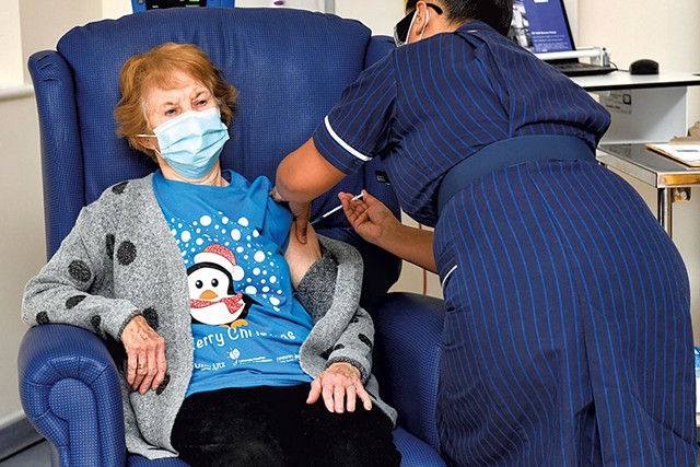 Margaret Keenan, 90, on Tuesday became the first patient in the United Kingdom to receive the Pfizer-BioNTech COVID-19 vaccine - JACOB KING/POOL VIA AP