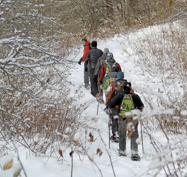 Guests on a snowshoe and tubing tour - COURTESY OF UMIAK OUTDOOR OUTFITTERS