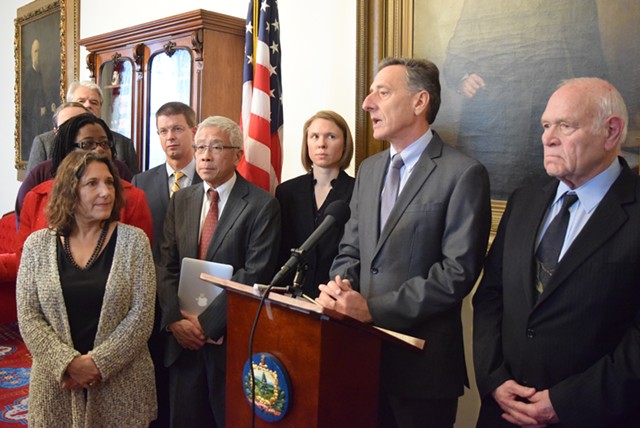 Gov. Peter Shumlin, with his health and environmental managers and lawmakers, outlines the water contamination problem in North Bennington. - TERRI HALLENBECK