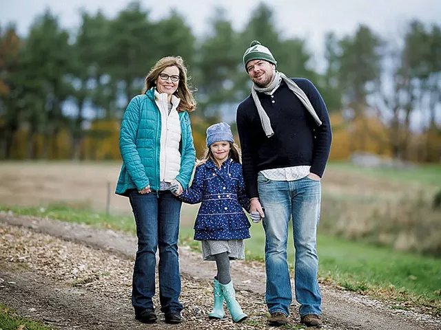 Erica Houskeeper with her husband, Dave Barron, and their daughter Phoebe - COURTESY OF ANDY DUBACK