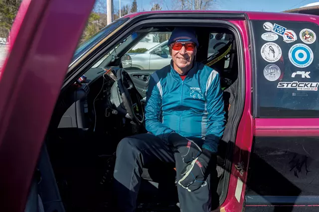 Sam Chambers in his car gearing up for adventure - JEB WALLACE-BRODEUR