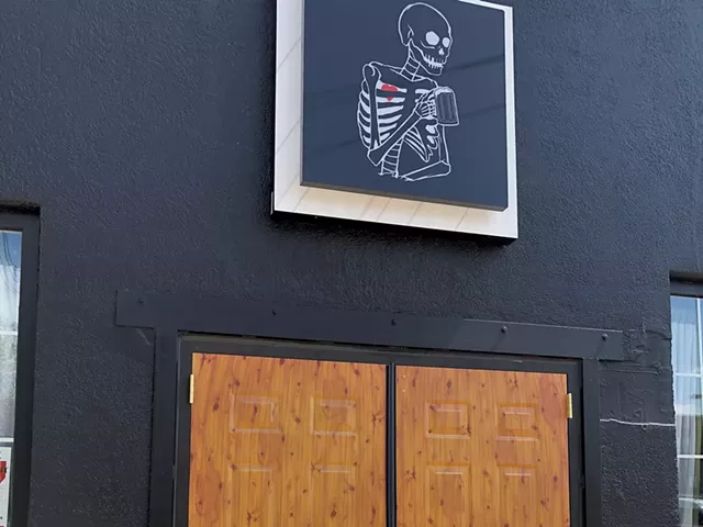 The skeleton sign above the door at Good Trouble - JORDAN BARRY ©️ SEVEN DAYS