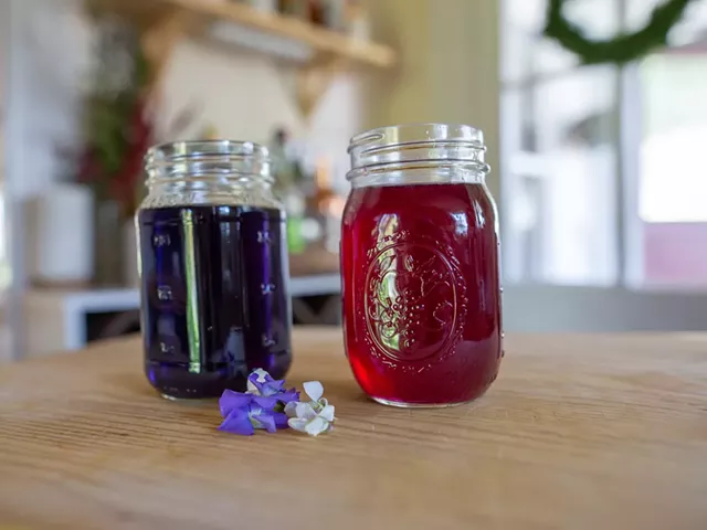 Violet syrup (left) and violet syrup with lemon juice added - JORDAN BARRY ©️ SEVEN DAYS