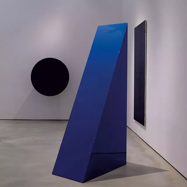 From left: "Untitled" by Anish Kapoor, "Untitled (Blue Wedge)" by John McCracken and "Untitled" by Olivier Mosset - COURTESY OF JEFFREY NINTZEL AND HALL ART FOUNDATION