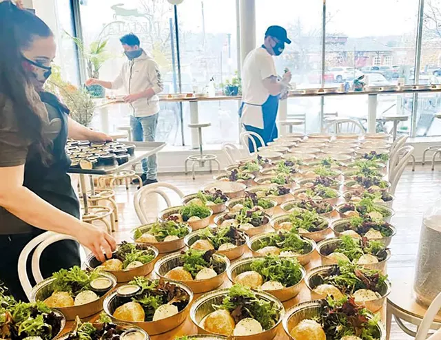 Preparing meals for Everyone Eats - COURTESY