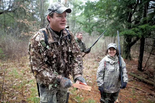 Frank Stanley using a turkey call with Louis Porter and Deb Markowitz - JAMES BUCK