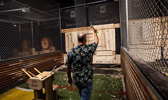 Rick Chaput tossing an axe at Burly Axe Throwing - LUKE AWTRY