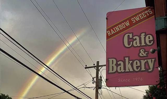 The sign at Rainbow Sweets Café & Bakery - COURTESY OF RAINBOW SWEETS CAFÉ & BAKERY