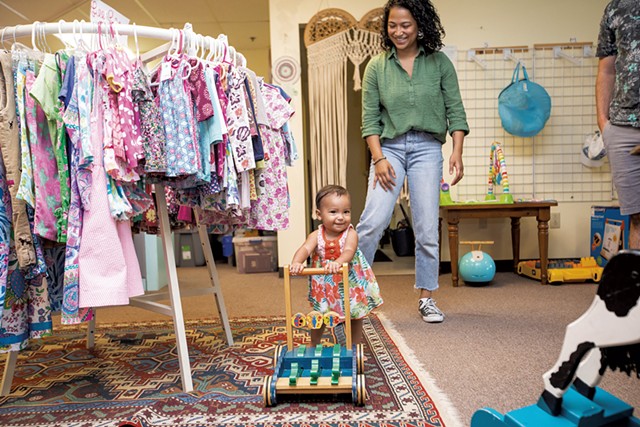 Maria Munroe and her 9-month-old daughter, Malia, shopping at Boho Baby - CAT CUTILLO