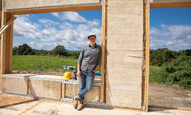 New Frameworks cofounder Ace McArleton on the site of a new build at Bread &amp; Butter Farm in Shelburne - LUKE AWTRY