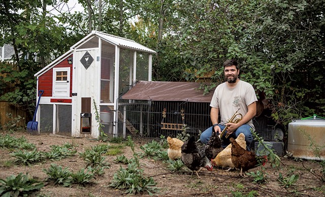 Will Andrews in his backyard chicken coop - LUKE AWTRY