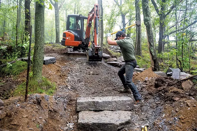Gordon Adams (left) and Pete Hiser building a trail - JAY ERICSON