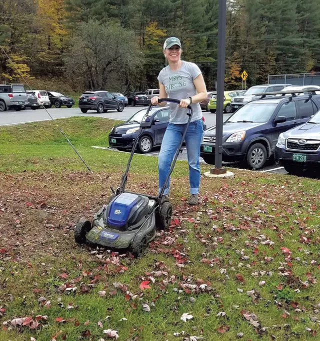 Montpelier Roxbury superintendent Libby Bonesteel mowing the lawn outside Montpelier High School - COURTESY OF SUE MONMANEY