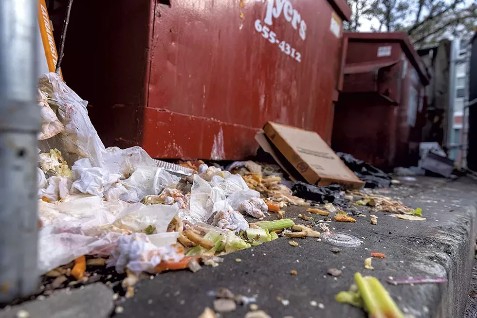 Overflowing dumpsters at a Bove complex in Essex Town Center - JAMES BUCK