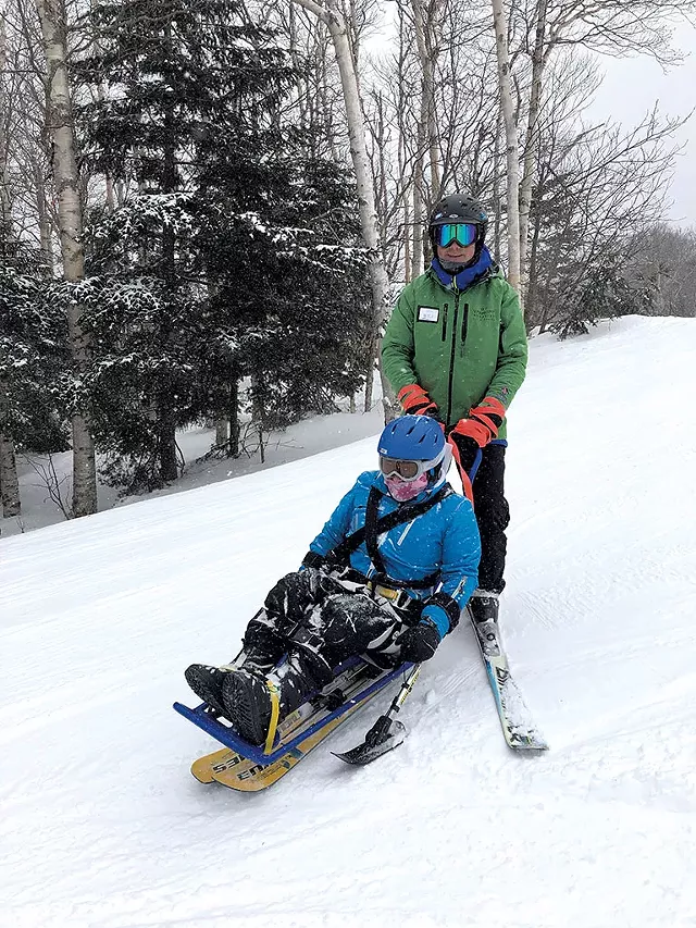 An adaptive skier and coach - COURTESY OF VERMONT ADAPTIVE SKI & SPORTS