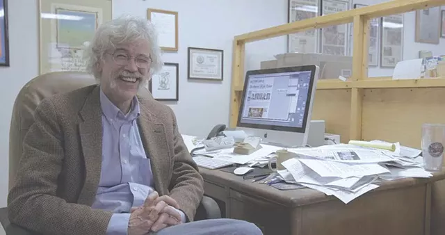 Editor Art Cullen at his desk in the Storm Lake Times newsroom - COURTESY OF JERRY RISIUS