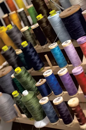 Spools of thread at Slow Process' studio. - LUKE AWTRY