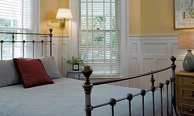 A bedroom at the Inn at Mountain View Farm - COURTESY