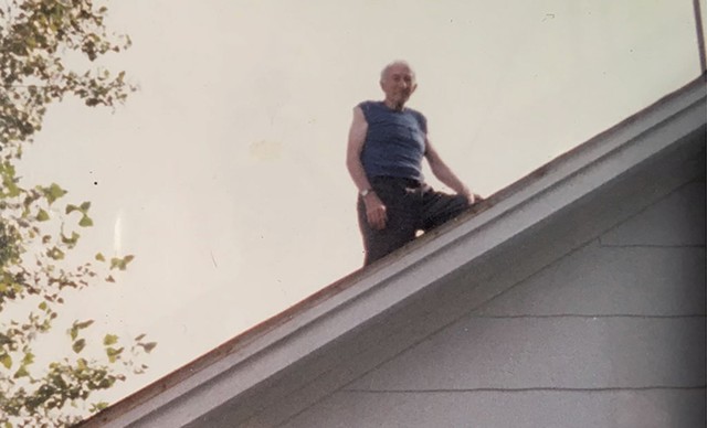 To the dismay of family members, Bill regularly worked on the roof of his home. - COURTESY