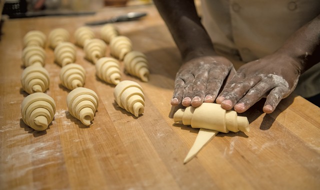 Chris Johnson rolling croissants - DARIA BISHOP