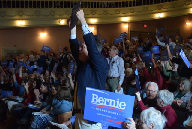 State convention delegates show their support for Sen. Bernie Sanders (I-Vt.) in Barre in May. - TERRI HALLENBECK